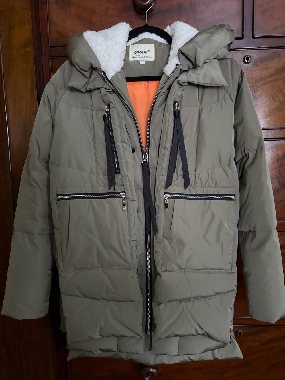 The Upper Eastside Iconic Amazon Coat. Orolay.